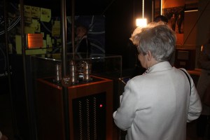 Mrs Sylwestrzak views a replica bomba in Hut 11A, Bletchley Park